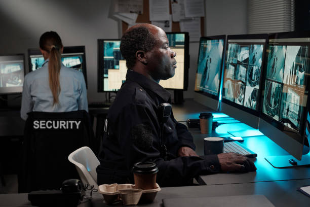 istock Officers working in surveillance room 2191755448