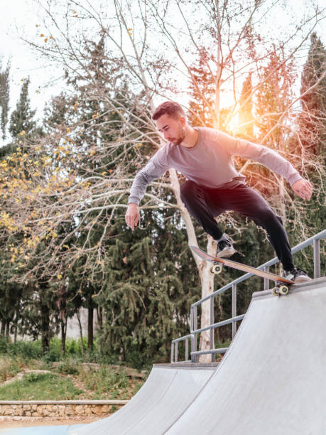 Skateboarder in mid-trick on ramp
