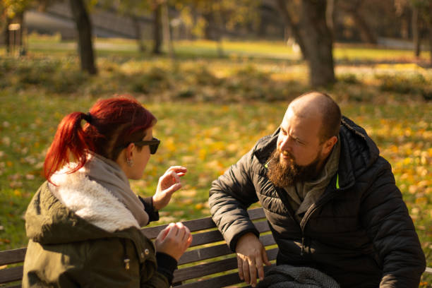 istock emotional conversation in autumn park 2191758668