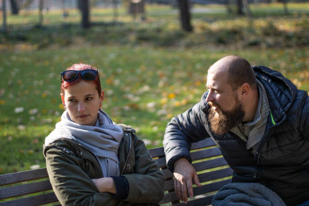 istock emotional conversation in autumn park 2191758689