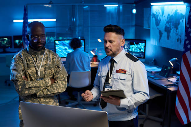 istock Military officers discussing online data 2191760282