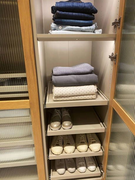 istock dressing room with men's shirts and belts 2191766335