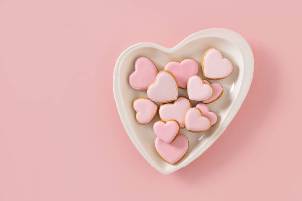 istock Valentine's Day heart shaped pink glazed cookies. 2191771309