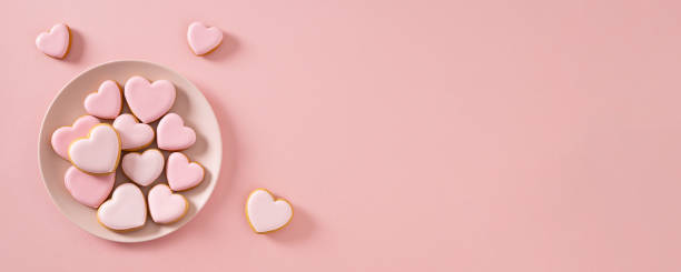 istock Valentine's Day heart shaped pink glazed cookies. 2191771314
