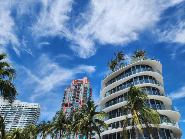 Architectural building in Miami beach. Skyscraper perspective view. Hotel architecture. Architecture modern building. Perspective residential skyscraper. Modern skyscraper building. Summer vacation.