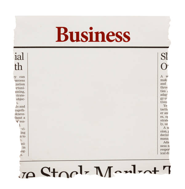 Torn piece of a simulated business newspaper with blank space for your copy. Design is by the photographer so this image is free of third-party copyright and may be used for any purpose.