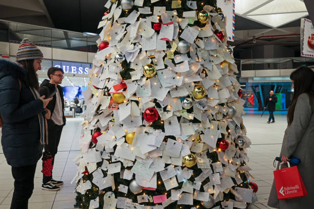 The Christmas tree set up in the central train station in Naples, Italy. stock photo