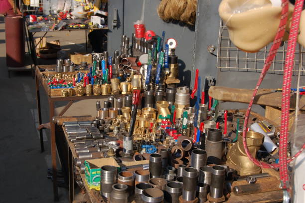 Bazaar Market mit with a focus on spare parts. Th eimage shows some people at the market stall, saptured druing summer season.
