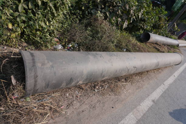 Big iron water pipes are kept on the roadside