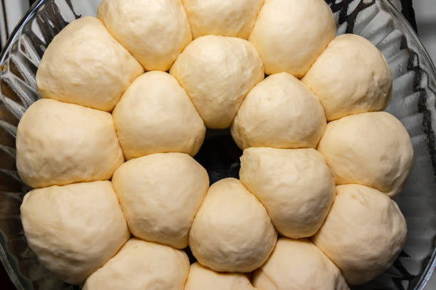istock Buns from raw dough. Cooking classic homemade dinner rolls 2191779870