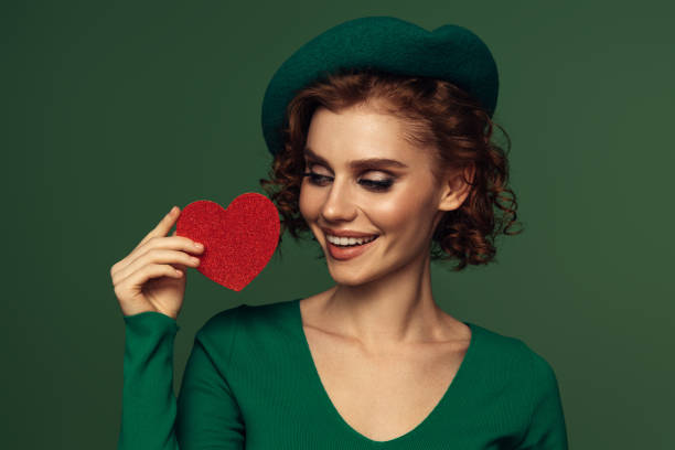 istock Holding Love Close: A Radiant Smile with a Heartfelt Touch 2191780190
