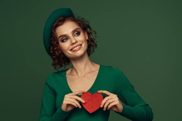istock Holding Love Close: A Radiant Smile with a Heartfelt Touch 2191780200