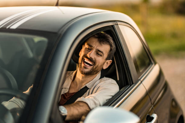 istock Happy man driving his car and having fun 2191782163
