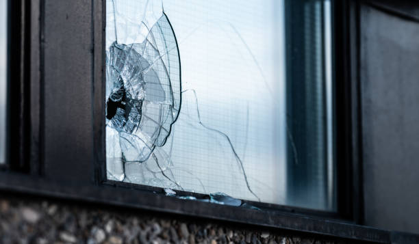 istock Badly damaged office window after a break in attempt.. 2191783762