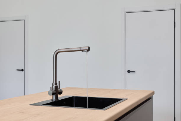istock Explore Modern Kitchen Design Featuring a Stylish Sink and Elegant Faucet for Your Home 2191792108