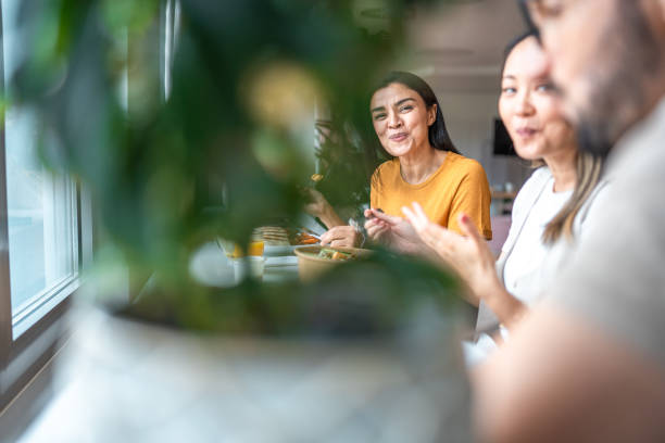 istock Diverse Team Dining at Stylish Office Luncheon 2191799661