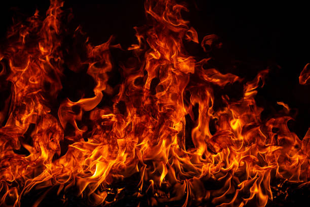 istock Fire blaze flames on black background. Fire burn flame isolated, abstract texture. Flaming explosion with burning effect. Fire wallpaper, abstract art pattern. 2191801629