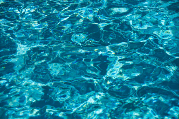 istock Blue ripped water in swimming pool, water pool texture and surface water backgraund. 2191803046