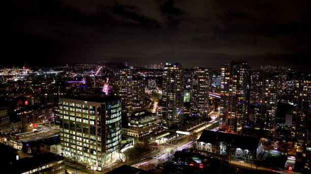 istock Dynamic Nighttime Cityscape with Illuminated Skyscrapers of Vancouver Canada 2191806126