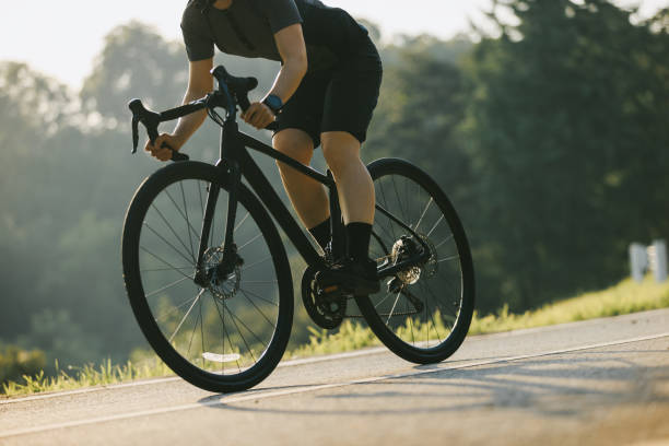 istock Woman cycling on summer park trail 2191807185