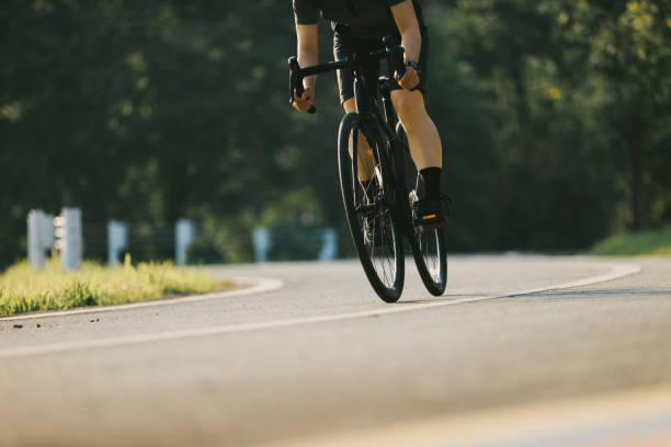 istock Woman cycling on summer park trail 2191807194