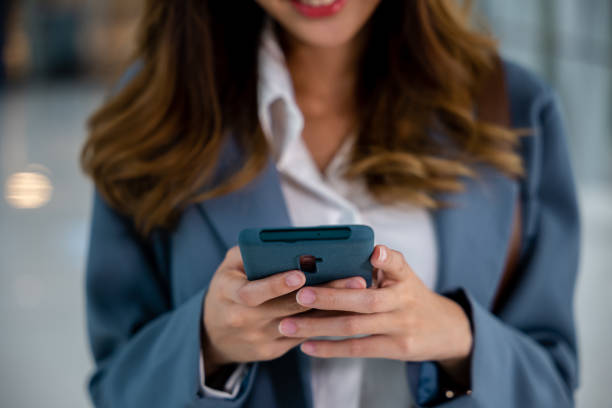 istock Female hands typing message on smartphone 2191808541