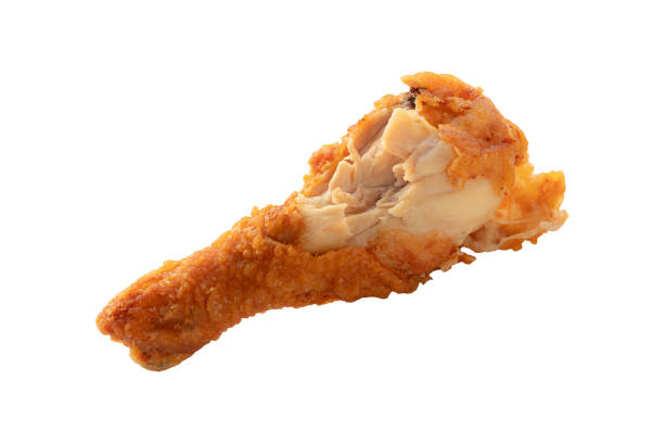istock bite of fried chicken drumsticks isolated on white background 2191811823