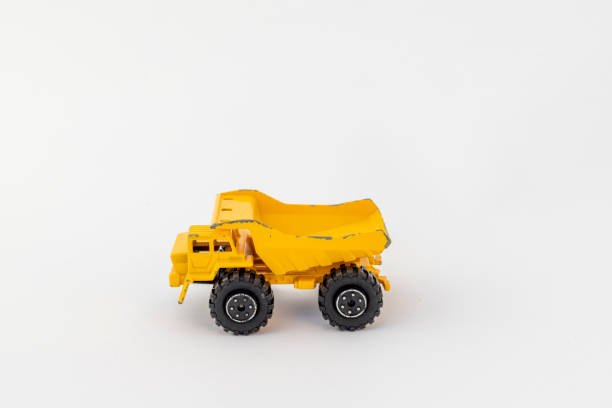 istock Classic yellow construction dump truck . Heavy machinery concept. 2191815525