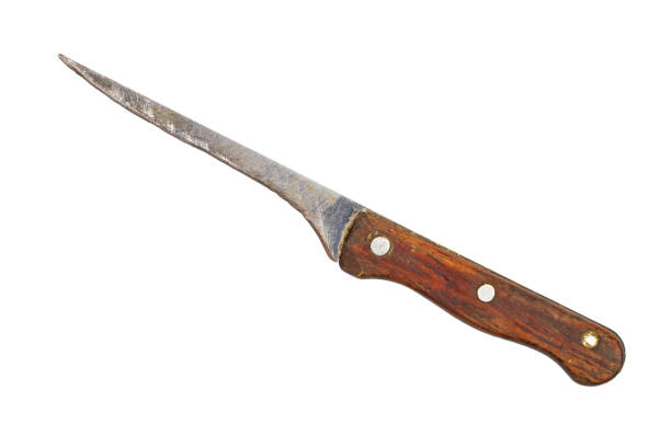 istock An old worn-out knife with a wooden handle on a white background. 2191816061