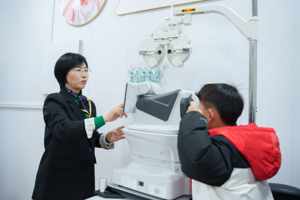 istock Female optometrist tests children's vision 2191816787