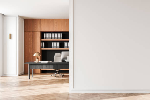 istock Modern office interior with blank white wall and wooden storage shelves, ideal for mockup presentations or design templates. 3D Rendering 2191822625