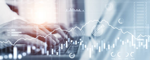 istock Businessman fingers typing on laptop, forex diagrams and dashboard 2191822649