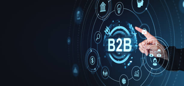 istock Business concept showcasing B2B network with various icons and graphics. Futuristic style on a dark background. Represents business, technology, and collaboration 2191822656