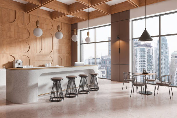 istock Luxury cafe interior with bar island and dining table with chairs in row 2191823680