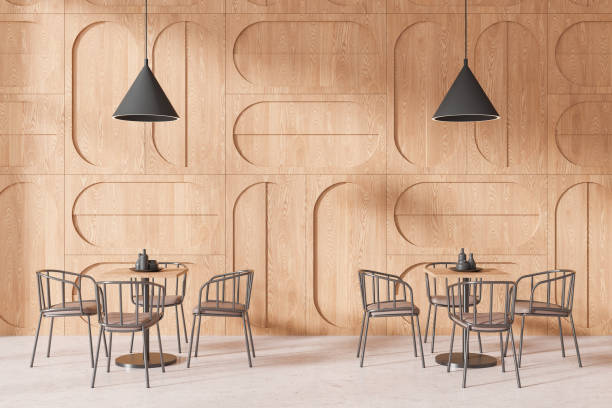 istock Modern cafe interior with chairs and eating tables in row on concrete floor 2191823758