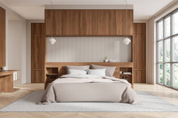 istock Modern bedroom interior with wood accents and large window. 3D Rendering 2191824021