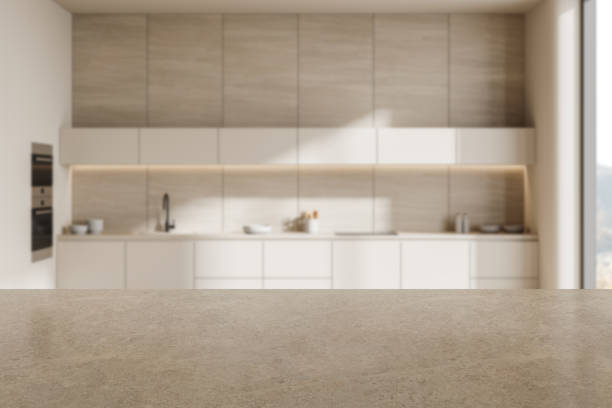 istock Blurred modern kitchen interior with stone countertop for product display or presentation mockup. 3D Rendering 2191824059