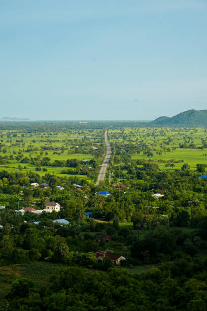Empty Road through Tropical Fields - Krong  Battambang, Cambodia