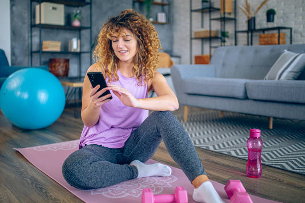 istock Woman fitness coaching on internet using smartphone 2191827859