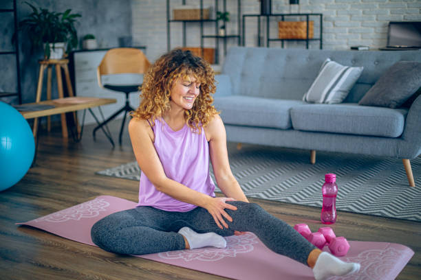 istock Woman have accident injury and hurt her leg while workout training 2191827886