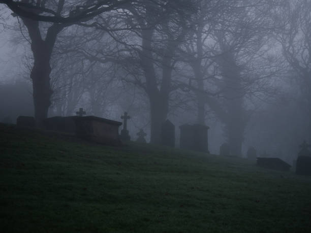 istock Eerie Graveard in thick fog and mist 2191830748