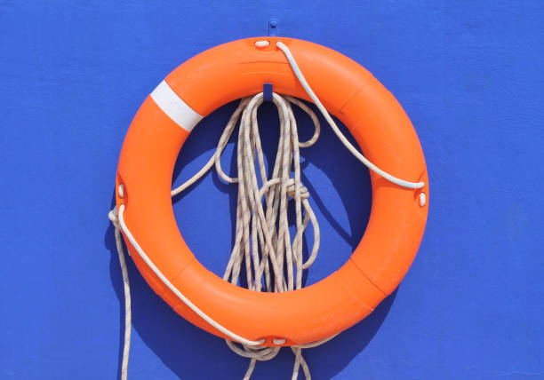 istock Lifebuoy with style on a blue wall, modern and sleek 2191833637