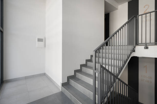 Modern Staircase with Gray Steps and Metal Railings