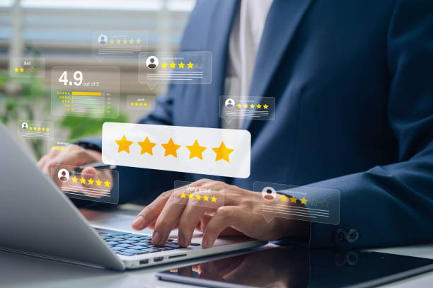istock Business Professional Analyzing Detailed Customer Reviews. Five Star Ratings Displayed on Laptop for Quality Feedback and Success Analysis 2191837963