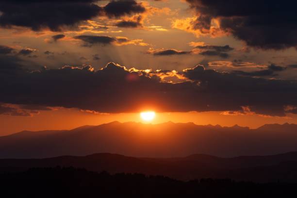 istock Breathtaking mountain sunset with vibrant sky. 2191843903