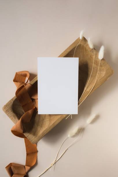 istock Minimalist flat lay with blank card and dried flowers. 2191844274