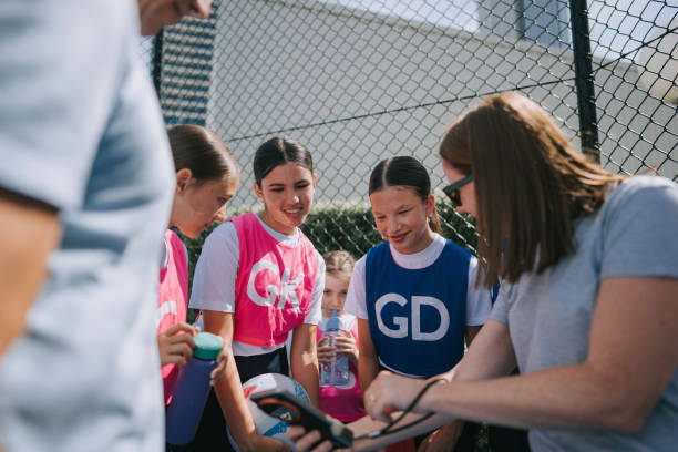istock Australian mother showing her daughters on video captured through her phone during their practice 2191845122