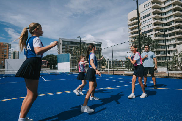 istock Australian netball team players practicing with coach guidance on routine matching in gold coast 2191845154