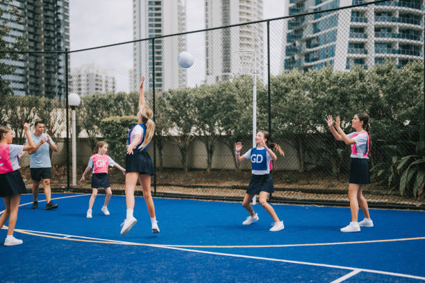 istock Australian netball team players practicing with coach guidance on routine matching in gold coast 2191845201