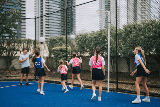 istock Australian netball team players practicing with coach guidance on routine matching in gold coast 2191845204